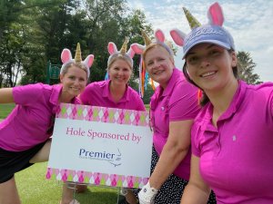 Women4wellness golf classic and social - four women staff members in pink and bunny ears