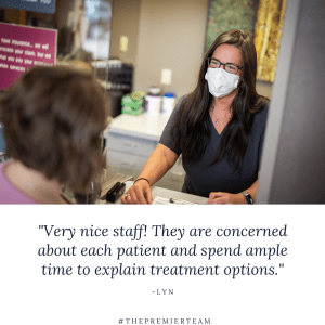 Quote of patient review with a staff member and patient at front desk